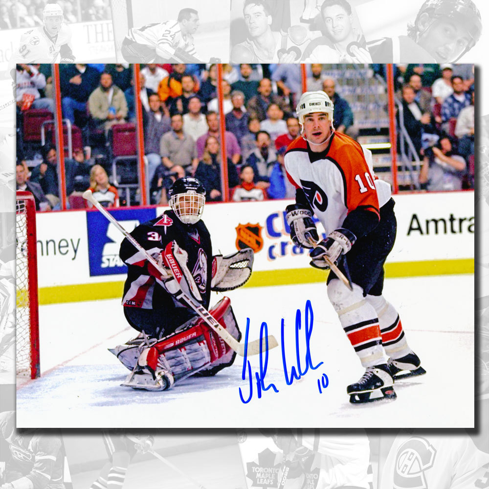 John LeClair Philadelphia Flyers vs. Hasek Autographed 8x10