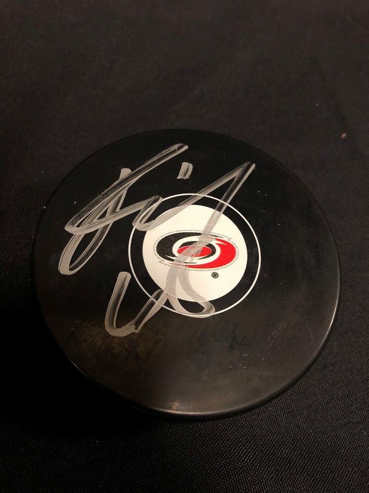 Ron Hainsey #65 Autographed, Practice-Used Puck
