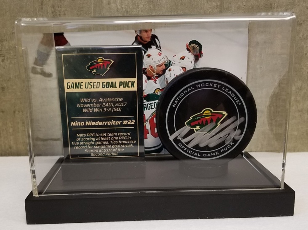 Wild Game Used Goal Pucks- Niederreiter PPG for team record, tying franchise record for six-game goal streak