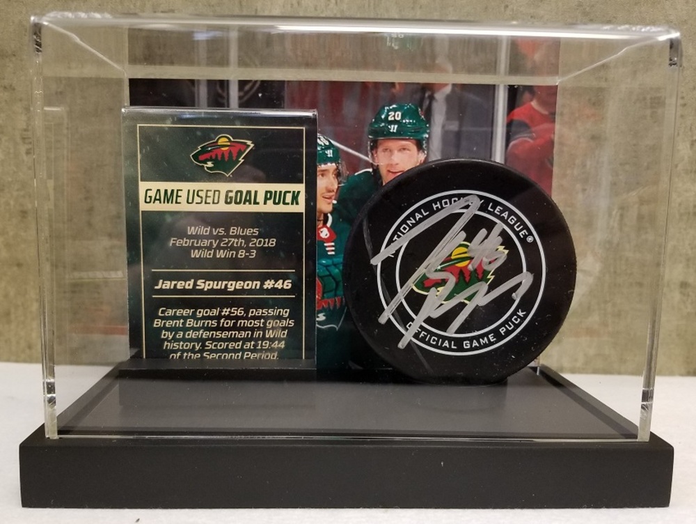Wild Game Used Goal Puck-Spurgeon Career Goal #56, passes Burns for most goals by Wild defenseman