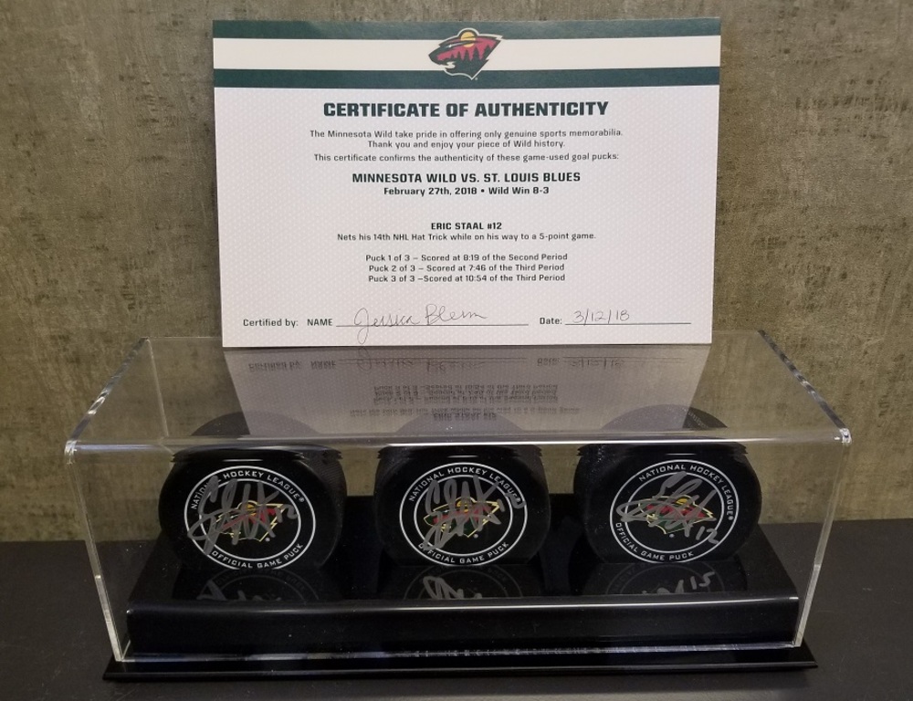 Wild Game Used Goal Puck-Staal 14th Career Hat Trick, 5 Point Game