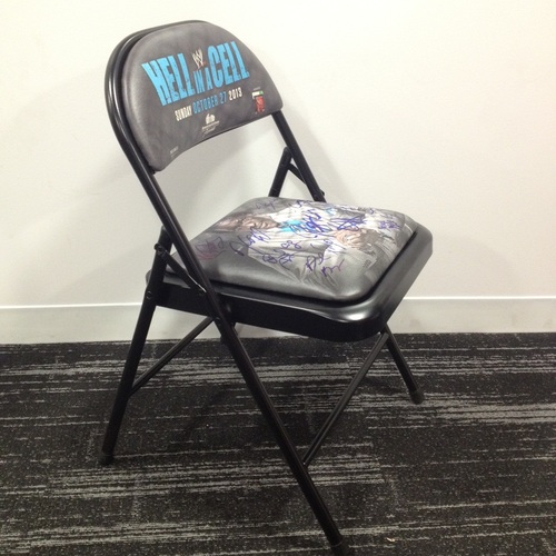 AUTOGRAPHED Hell In A Cell 2013 Event Chair (signed by multiple superstars)