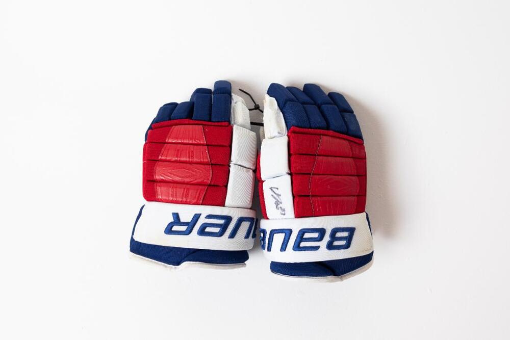 Signed and Game-Used Bauer Gloves by #23 Adam Fox - New York Rangers