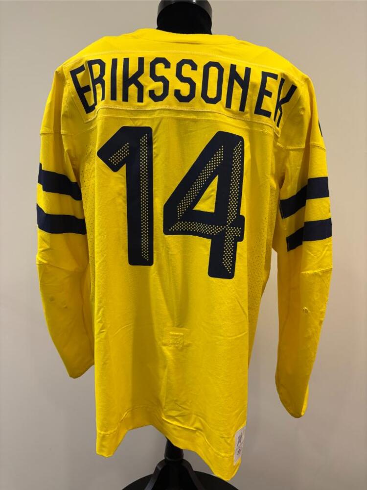 Joel Eriksson Ek Sweden Game-Used Gold Jersey worn v. Finland on February 13, 2026, as a part of the 2026 Milano Cortina Winter Games.