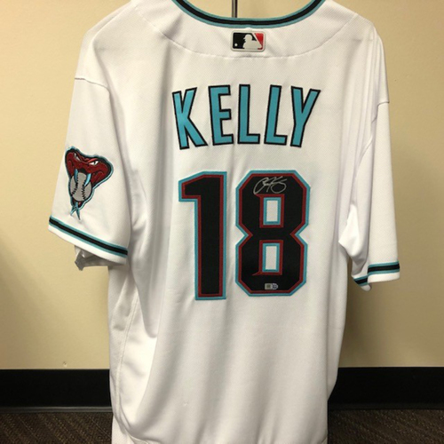 Photo of Carson Kelly Autographed Jersey