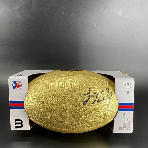 NFL - Jaguars Logan Cooke Signed Gold Composite Football