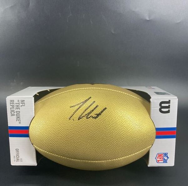 NFL - Jaguars Travis Hunter Signed Gold Composite Football