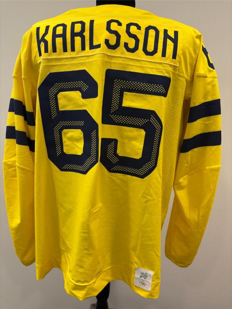 Erik Karlsson Sweden Game-Used Gold Jersey worn v. Finland on February 13, 2026, as a part of the 2026 Milano Cortina Winter Games.