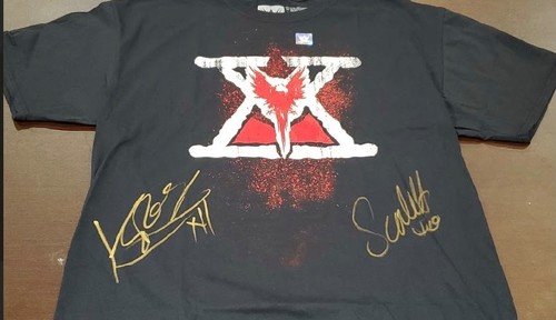 Karrion Kross and Scarlett Signed \