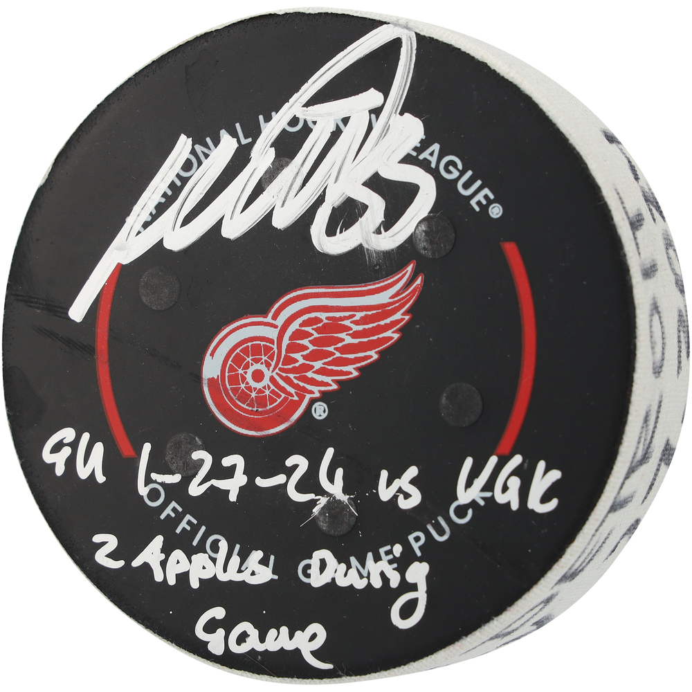 Moritz Seider Detroit Red Wings Autographed Game-Used Puck vs. Vegas Golden Knights on January 27, 2024 with Multiple Inscriptions