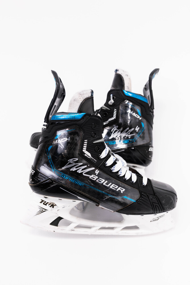 Signed and Game-Used Bauer Skates by #4 Braden Schneider