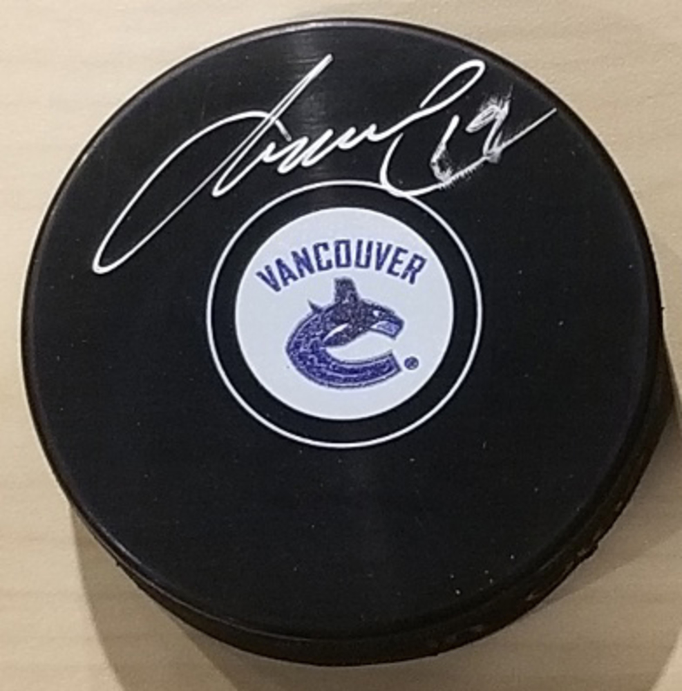 Markus Naslund Vancouver Canucks Signed Autograph Model Hockey Puck *Autograph Slighlty Smudged*