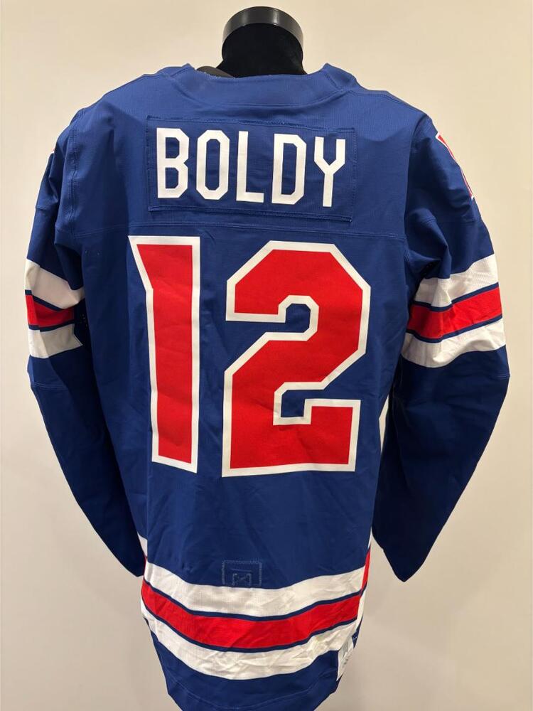 Matt Boldy USA Game-Used Blue Jersey worn v. Denmark on February 14, 2026, as a part of the 2026 Milano Cortina Winter Games.