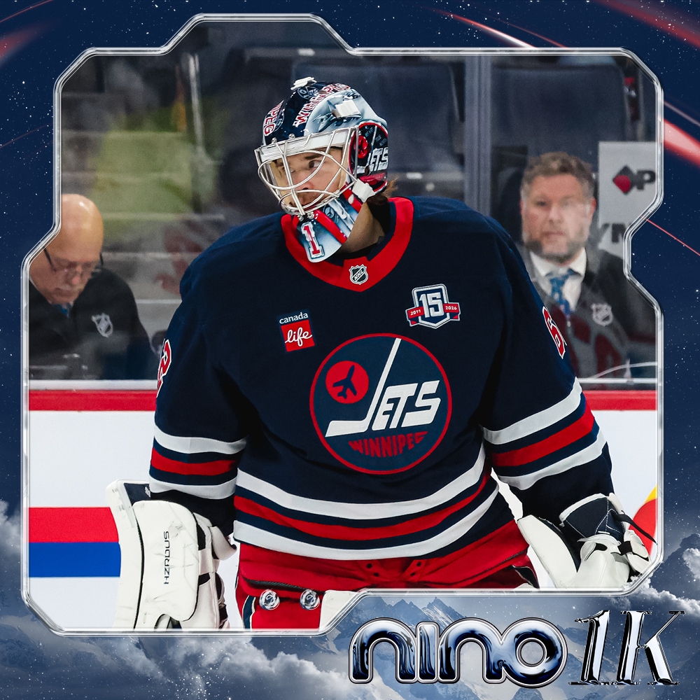 Eric Comrie #1 Warmup Worn Nino Niederreiter Commemorative Jersey