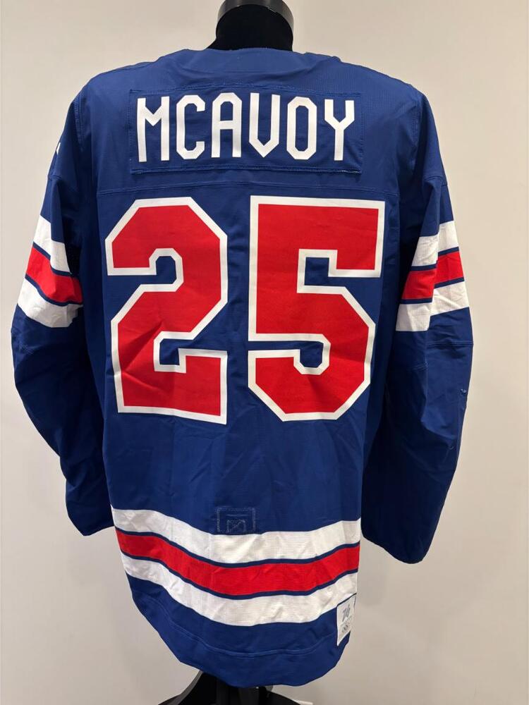 Charlie McAvoy USA Game-Used Blue Jersey worn v. Denmark on February 14, 2026, as a part of the 2026 Milano Cortina Winter Games.