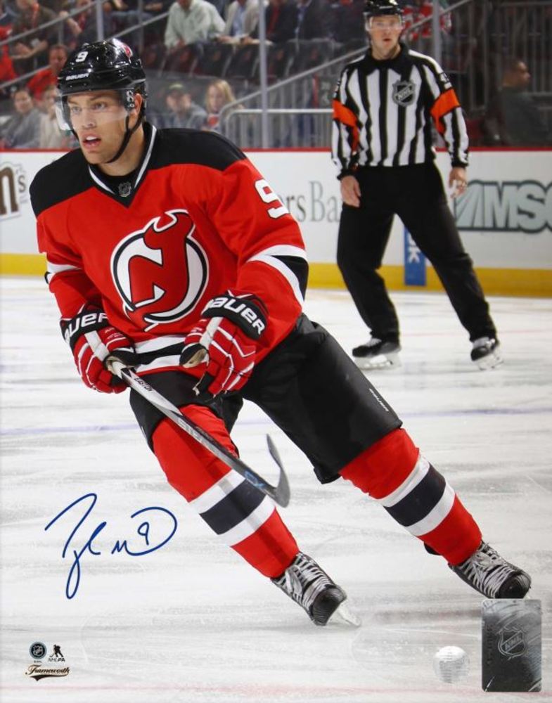 Taylor Hall - Signed 8x10 Unframed Devils Red Action