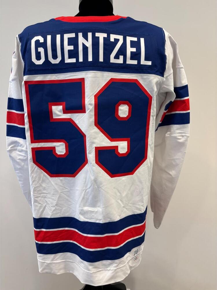 Jake Guentzel USA Game-Used White Jersey worn v. Germany on February 15, 2026, as a part of the 2026 Milano Cortina Winter Games.