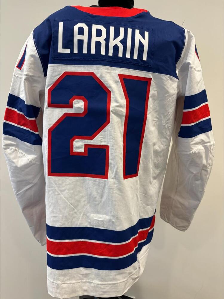 Dylan Larkin USA Game-Used White Jersey worn v. Germany on February 15, 2026, as a part of the 2026 Milano Cortina Winter Games.