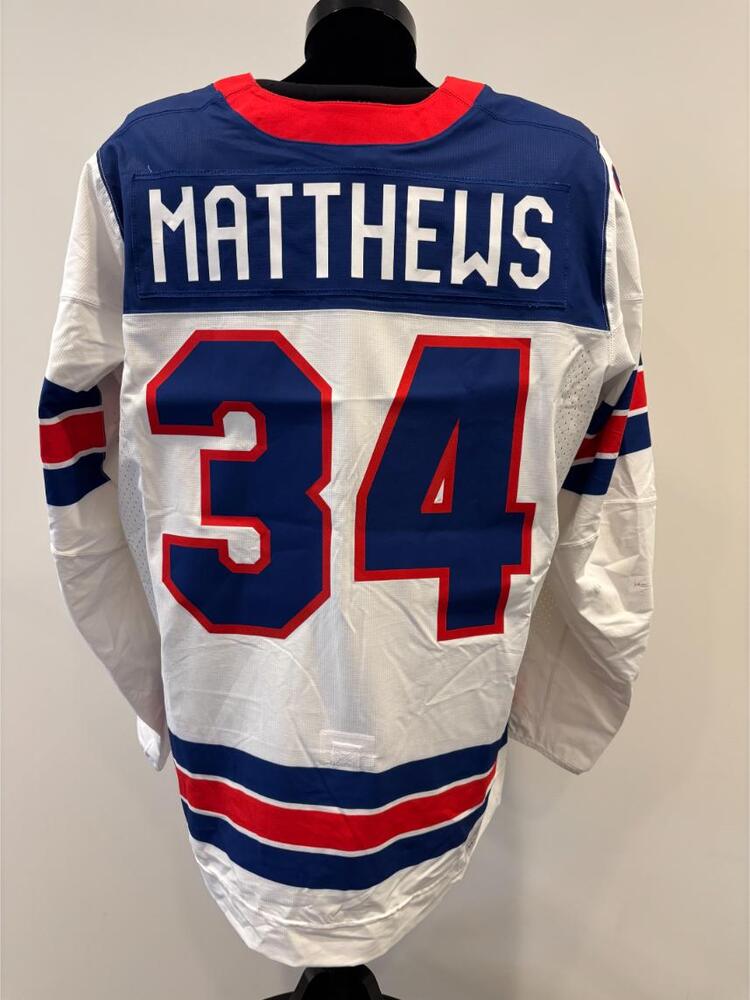 Auston Matthews USA Game-Used White Jersey worn v. Germany on February 15, 2026, as a part of the 2026 Milano Cortina Winter Games.
