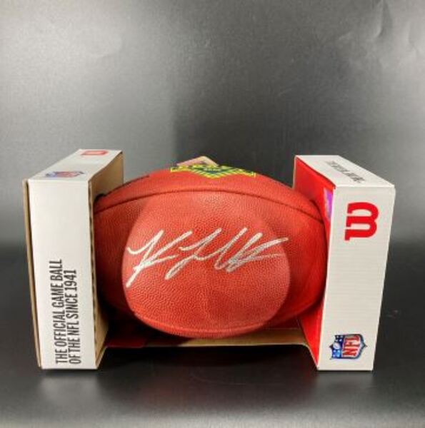 NFL - Titans Keldric Faulk Signed Authentic Football with Draft Logo