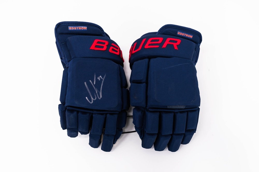 Signed and Game-Used Bauer Navy Third Gloves by #84 Adam Edstrom
