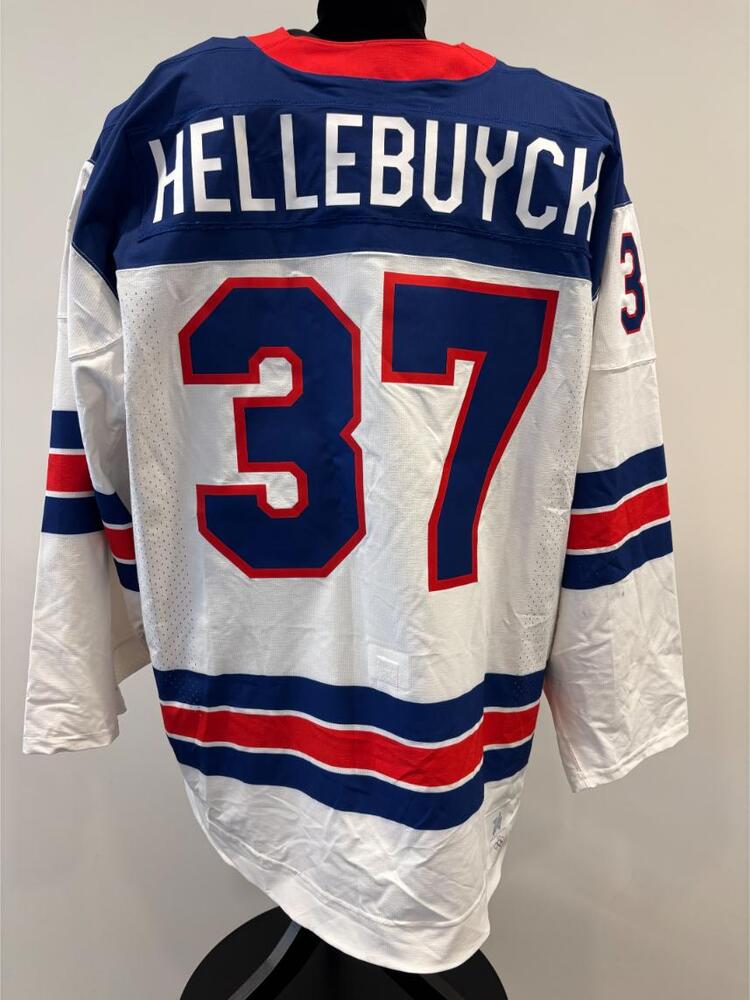 Connor Hellebuyck USA Game-Used White Jersey worn v. Germany on February 15, 2026, as a part of the 2026 Milano Cortina Winter Games.