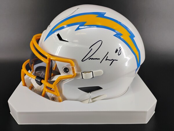 Chargers Mid-Sized Helmet Autographed by Omarion Hampton. All proceeds b...