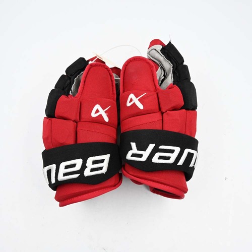 Image of Pesce, Brett<br>Bauer Supreme Mach Gloves<br>Carolina Hurricanes<br>2023-24<br>#22