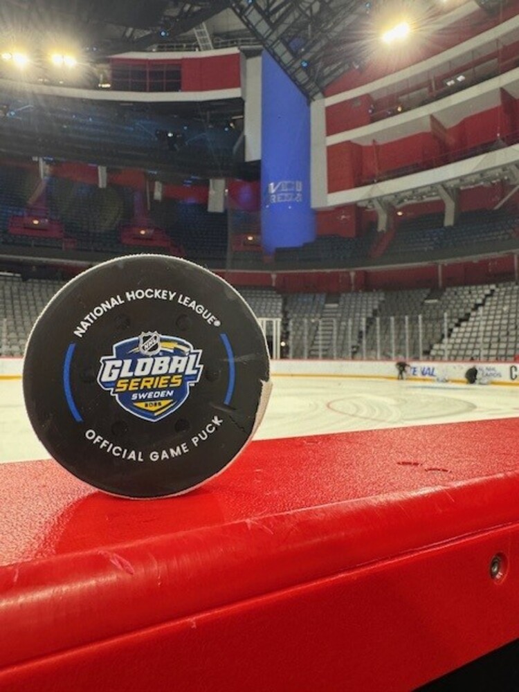 Game-Used Puck from the 2025 NHL Global Series Between the Nashville Predators on Pittsburgh Penguins on November 14, 2025 - Used During 1st Period