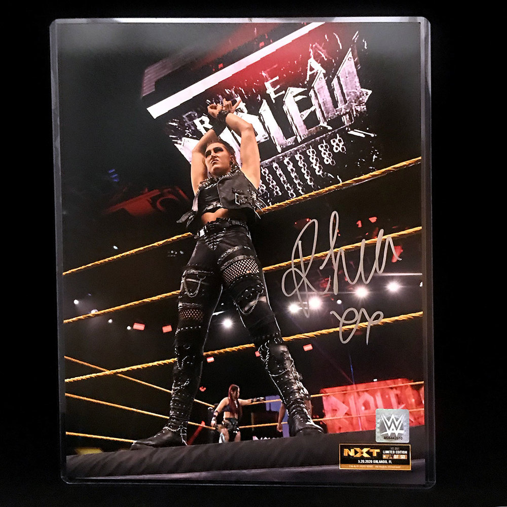 Rhea Ripley Signiture Rhea Ripley SIGNED 11x14 (Random Number) | WWE Auction