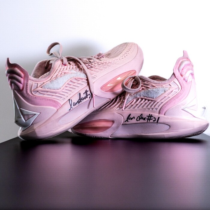 Photo of Ian Clark #21 S.E. Melbourne Phoenix Signed Match-Worn Pink Sneakers