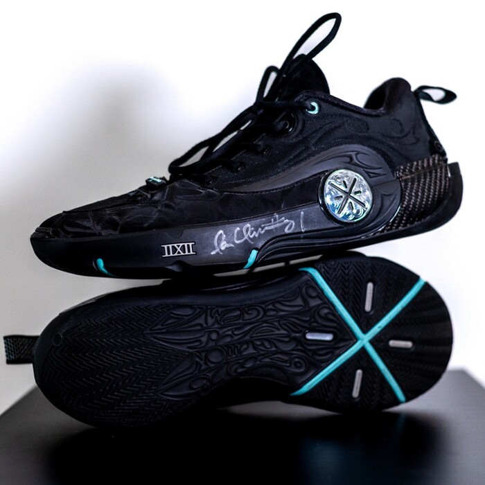 Photo of Ian Clark #21 S.E. Melbourne Phoenix Signed Match-Worn Black Sneakers