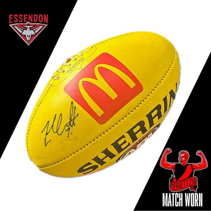 Photo of Zach Merrett #7 Essendon Match-Used and Signed Milestone Football