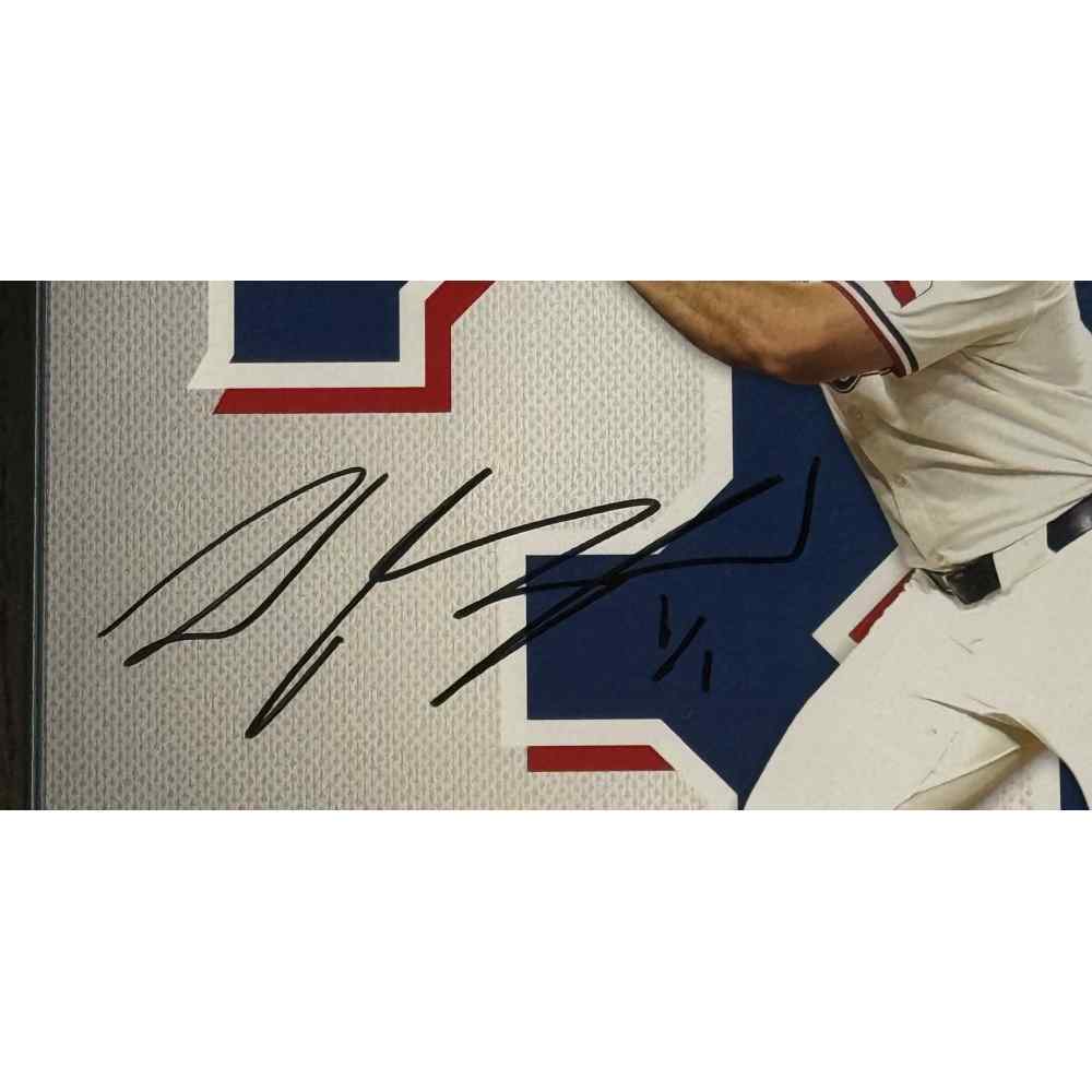 Wyatt Langford Autographed 1-of-1 Impact Frame with Piece of Game