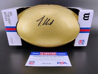 NFL - Jaguars Travis Hunter Signed Gold Composite Football