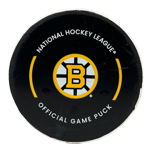 Photo of Game-Used Mark Kastelic Goal Puck (SH) - vs. Kraken (Chara Jersey Retirement Night) - 1/15/2025