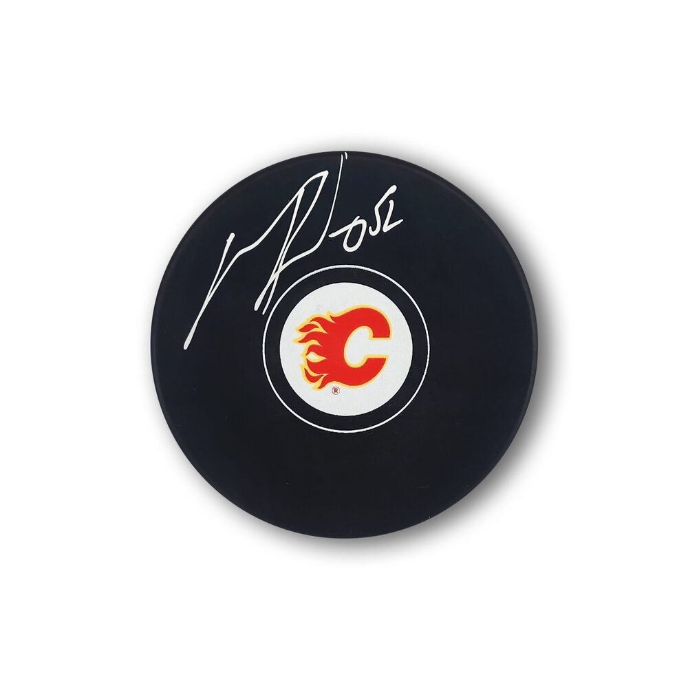 MacKenzie Weegar Autographed Calgary Flames Hockey Puck