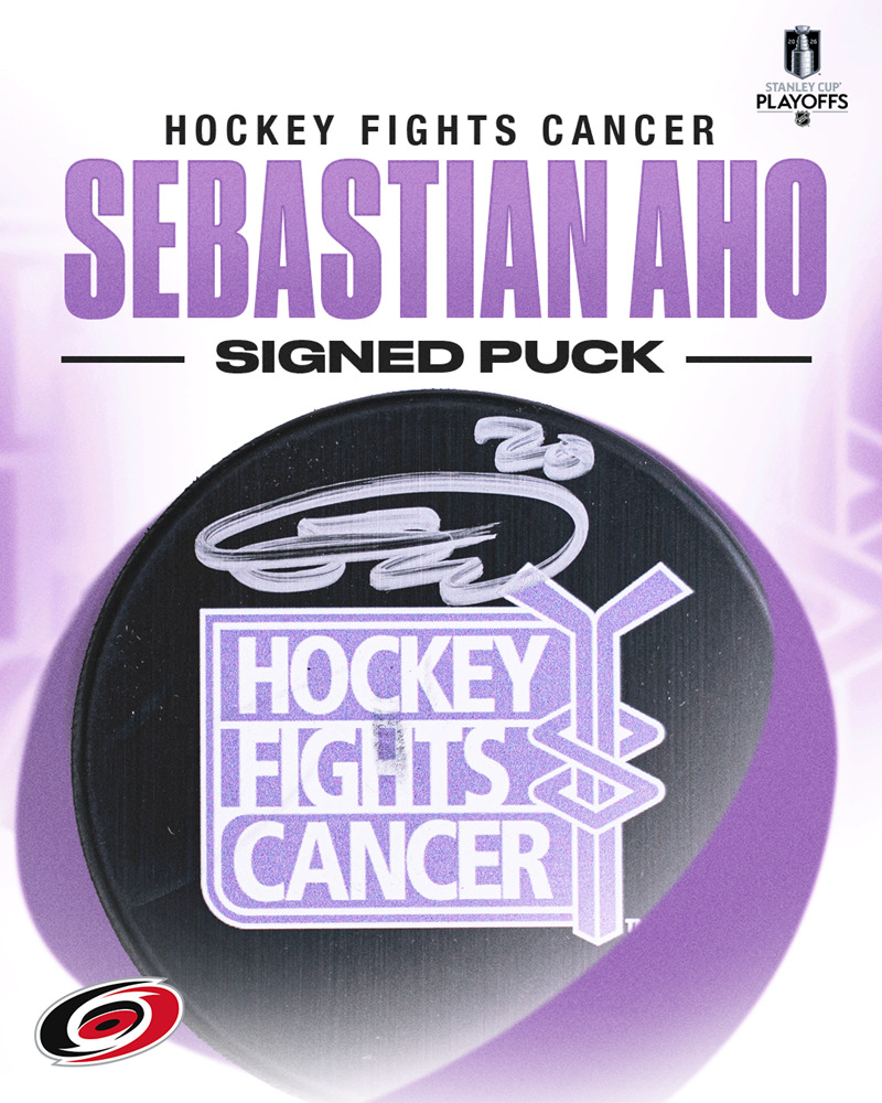 Sebastian Aho Autographed Hockey Fights Cancer Puck - Carolina Hurricanes