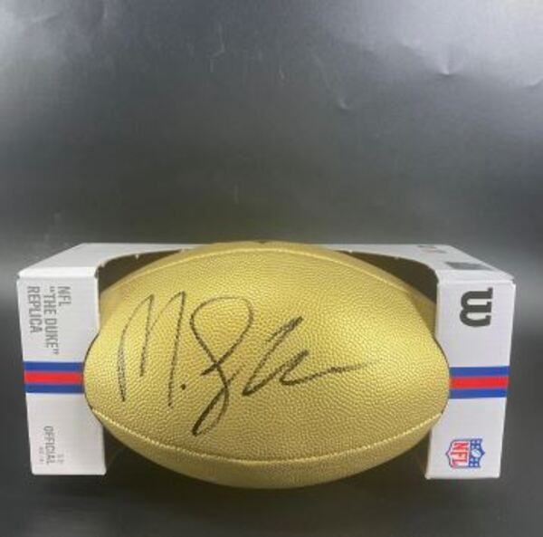 NFL - Ravens Malaki Starks Signed Gold Composite Football