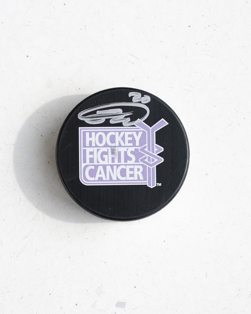 Sebastian Aho Autographed Hockey Fights Cancer Puck - Carolina Hurricanes