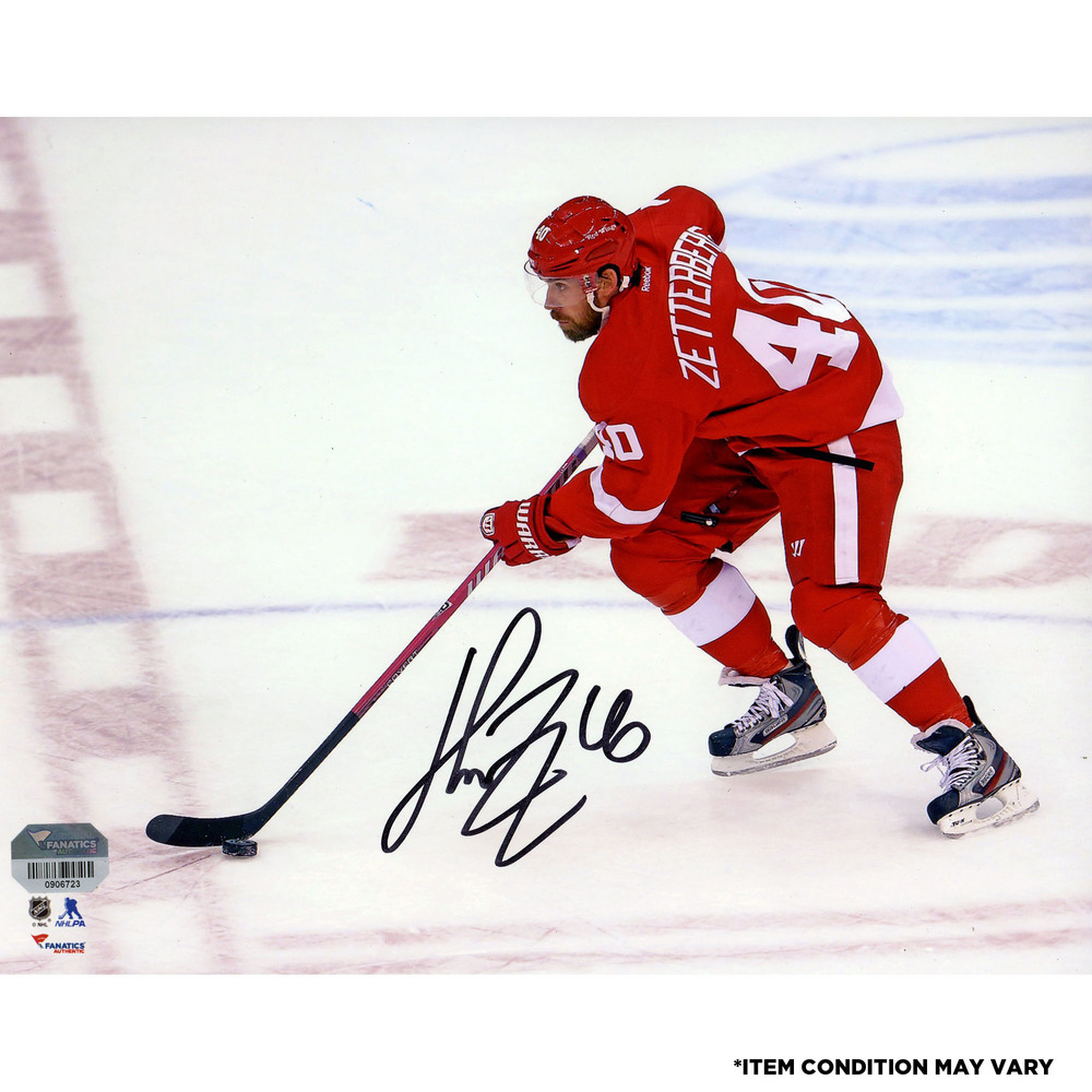 Henrik Zetterberg Detroit Red Wings Autographed Skating With Puck 8