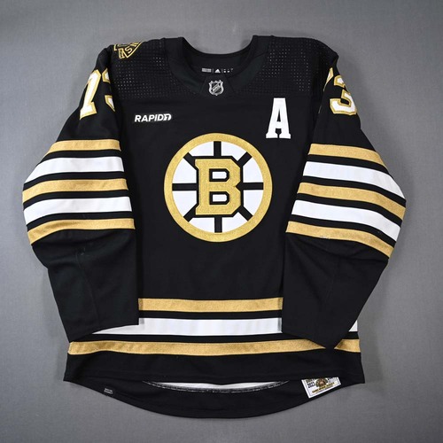 Image of McAvoy, Charlie<br>Black Centennial Set 1 - Photo-Matched to October 26 & 30, 2023<br>Boston Bruins<br>2023-24<br>#73