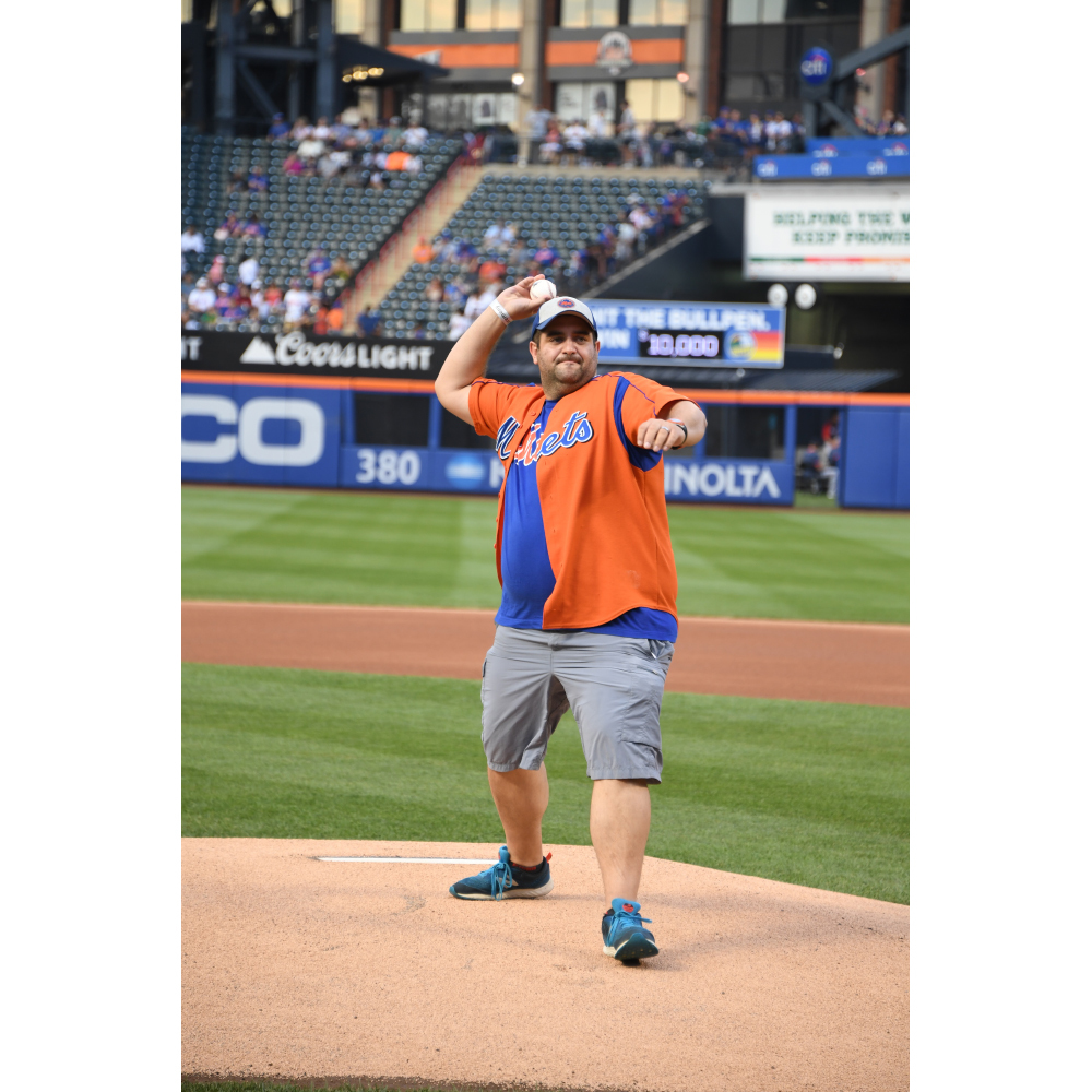 Amazin' Auction Throw out First Pitch at Mets Game on September 30