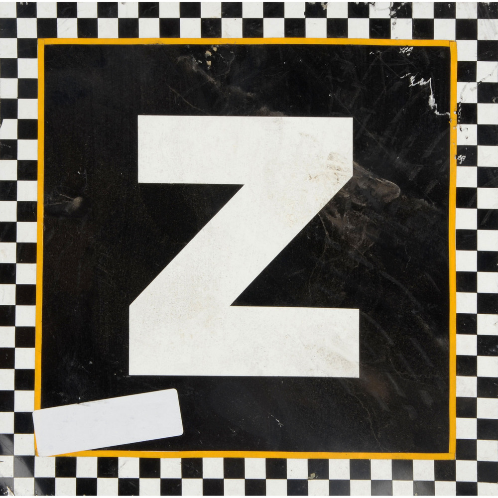 Daytona International Speedway Black with Checkerd Trim Letter Z 12