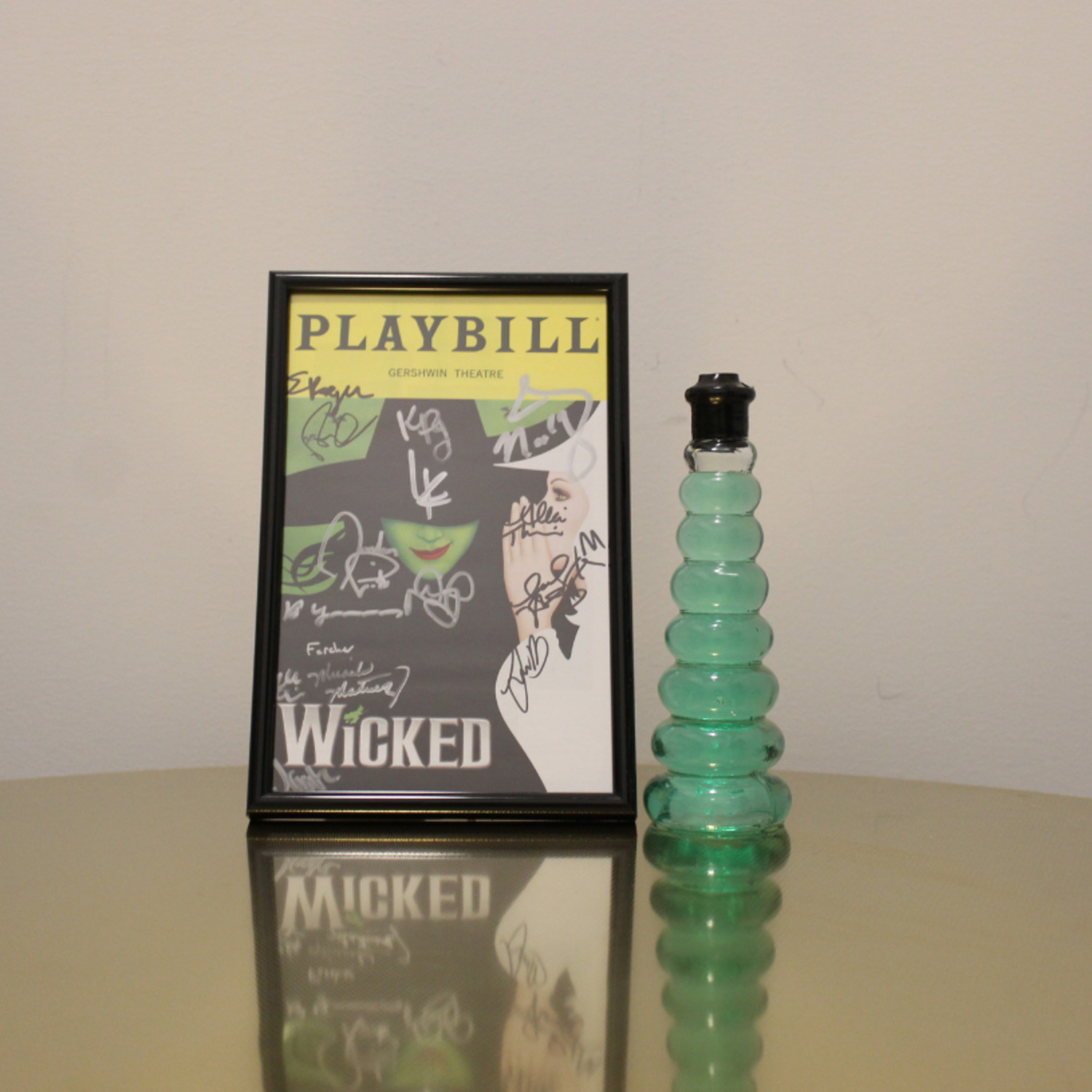 Photo of WICKED Green Elixir and Autographed Playbill