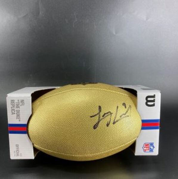 NFL - Jaguars Logan Cooke Signed Gold Composite Football
