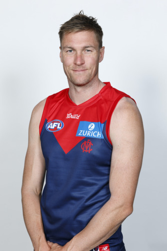 Photo of 2025 Melbourne Demons Red Flamehead Guernsey - Tom McDonald #25