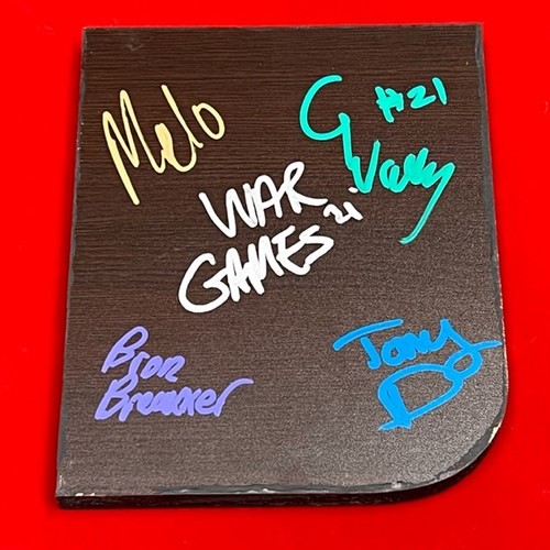 Carmelo Hayes, Bron Breakker, Tony D'Angelo, and Grayson Waller SIGNED and USED Table Piece (NXT WarGames 2021)