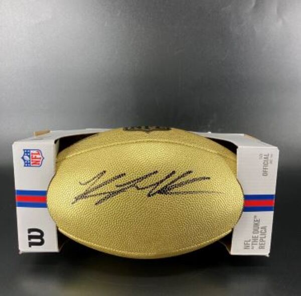 NFL - Titans Keldric Faulk Signed Gold Composite Football