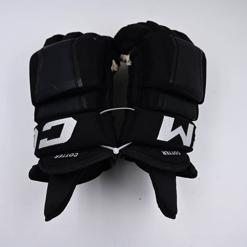 Image of Cotter, Paul - Game-Worn Black Third, CCM HG97 Gloves - 2025-26 NHL Season